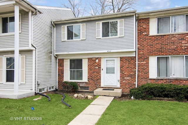 452 Mallview Ln, Bolingbrook, IL 60440 - multi unit property featuring a front yard and brick siding