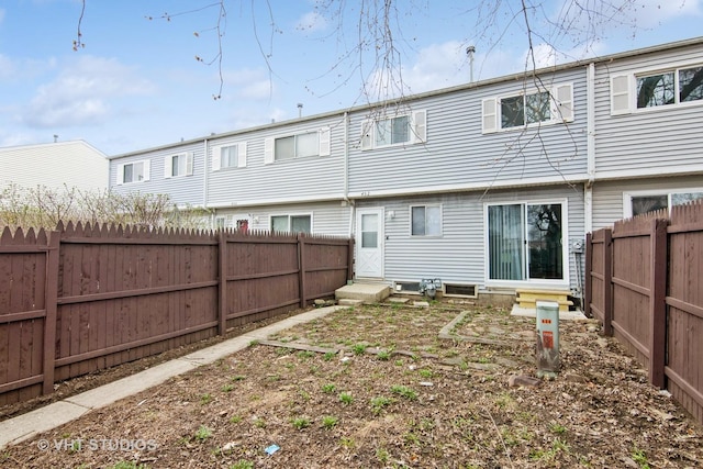 452 Mallview Ln, Bolingbrook, IL 60440 - rear view of house featuring entry steps and a fenced backyard