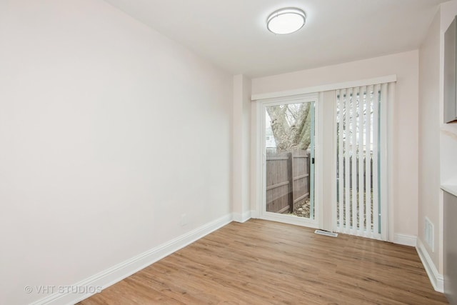 452 Mallview Ln, Bolingbrook, IL 60440 - empty room with light wood-style flooring and baseboards