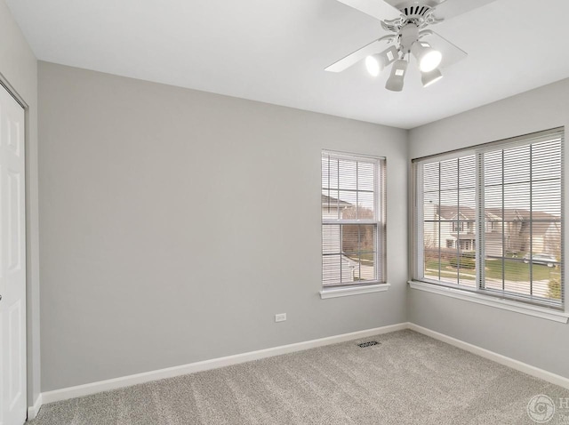533 Jackson Blvd, Grayslake, IL 60030 - carpeted spare room featuring baseboards and ceiling fan