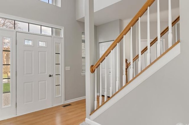 533 Jackson Blvd, Grayslake, IL 60030 - foyer entrance with wood finished floors, a towering ceiling, and stairway