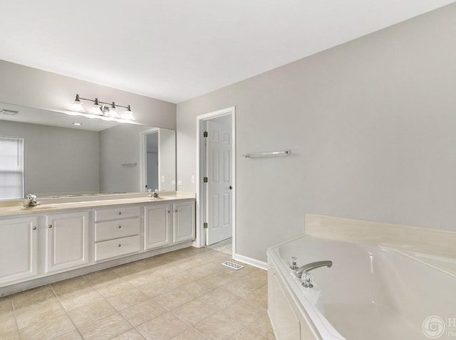 533 Jackson Blvd, Grayslake, IL 60030 - bathroom featuring double vanity and a garden tub