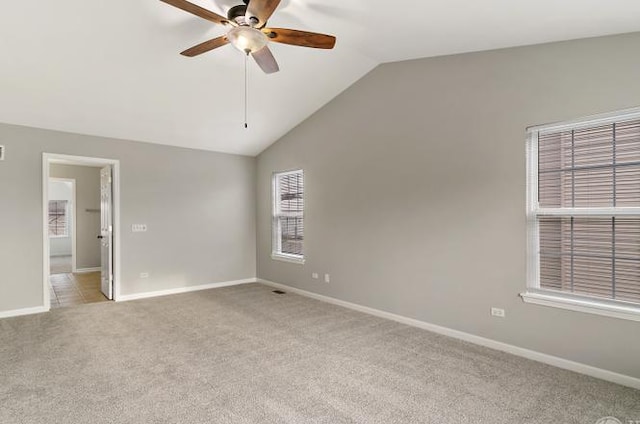 533 Jackson Blvd, Grayslake, IL 60030 - spare room with light colored carpet, a ceiling fan, and vaulted ceiling