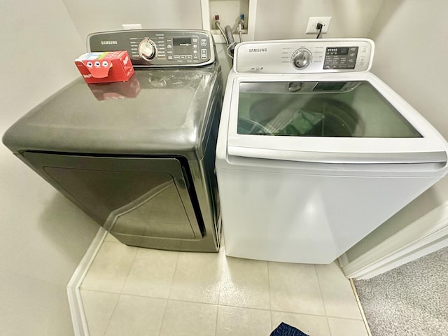 533 Jackson Blvd, Grayslake, IL 60030 - washroom featuring washing machine and clothes dryer and tile patterned floors