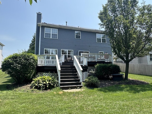 533 Jackson Blvd, Grayslake, IL 60030 - rear view of property with stairway, a chimney, and a wooden deck