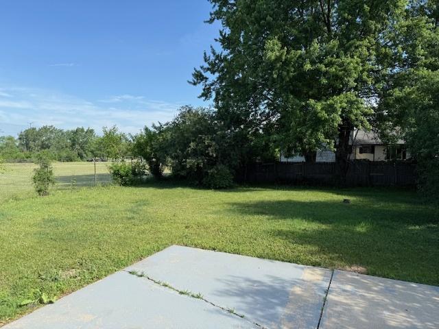 3018 20th St, North Chicago, IL 60064 - view of grassy yard featuring a patio area