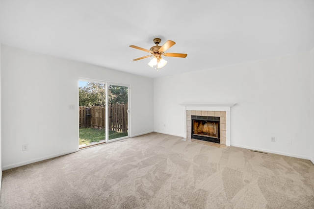 643 N Bridgeport Ter, Lindenhurst, IL 60046 - unfurnished living room featuring a fireplace, carpet, and ceiling fan
