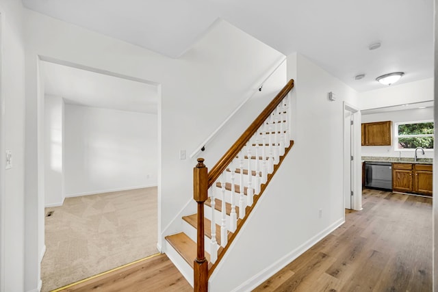 643 N Bridgeport Ter, Lindenhurst, IL 60046 - stairway featuring wood finished floors and baseboards