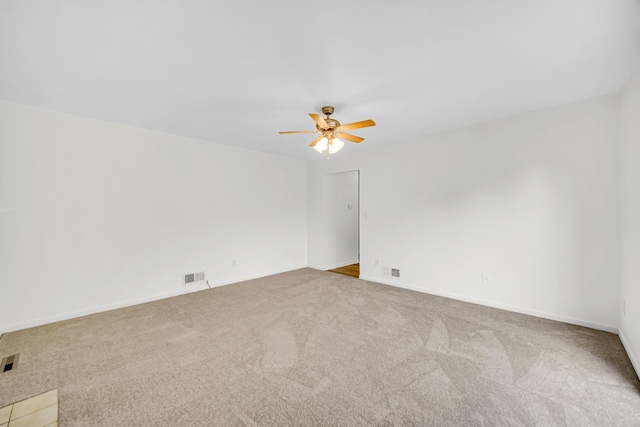 643 N Bridgeport Ter, Lindenhurst, IL 60046 - carpeted empty room featuring a ceiling fan and baseboards
