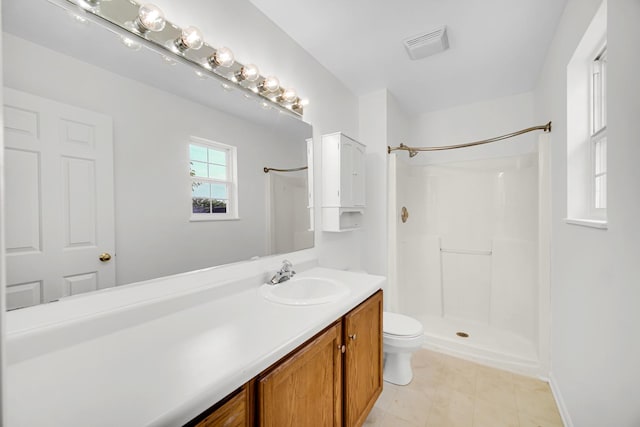 643 N Bridgeport Ter, Lindenhurst, IL 60046 - bathroom with vanity, a shower, and tile patterned floors