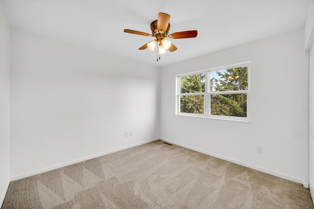 643 N Bridgeport Ter, Lindenhurst, IL 60046 - unfurnished room featuring light carpet and a ceiling fan