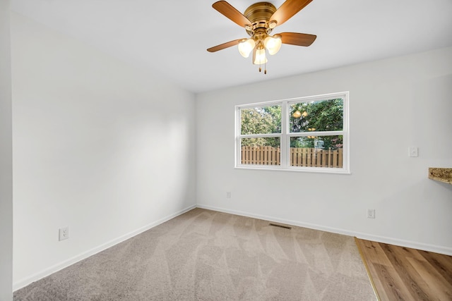 643 N Bridgeport Ter, Lindenhurst, IL 60046 - unfurnished room with a ceiling fan and carpet floors