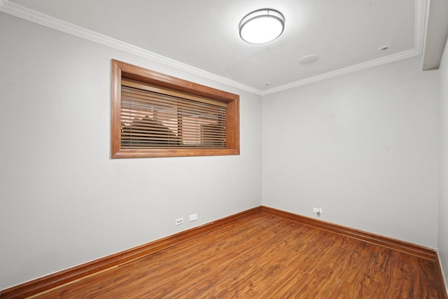 2753 N Spaulding Ave Unit Gs, Chicago, IL 60647 - unfurnished room featuring ornamental molding and wood finished floors