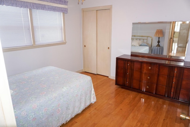 7632 W Norridge St, Harwood Heights, IL 60706 - bedroom featuring wood finished floors and a closet