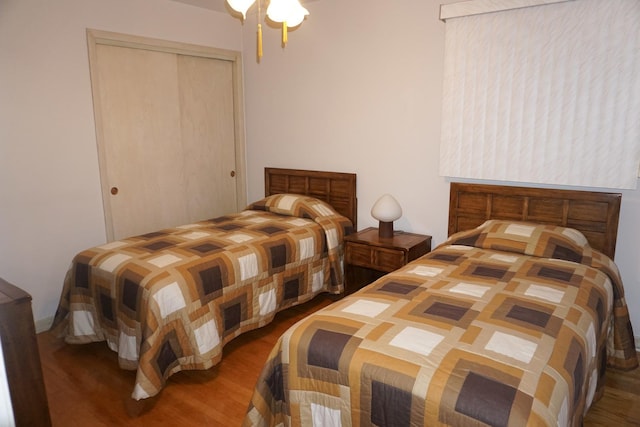 7632 W Norridge St, Harwood Heights, IL 60706 - bedroom featuring wood finished floors, a closet, and a ceiling fan