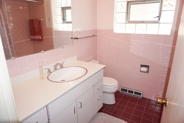 7632 W Norridge St, Harwood Heights, IL 60706 - bathroom with tile walls, vanity, tile patterned flooring, and a wainscoted wall