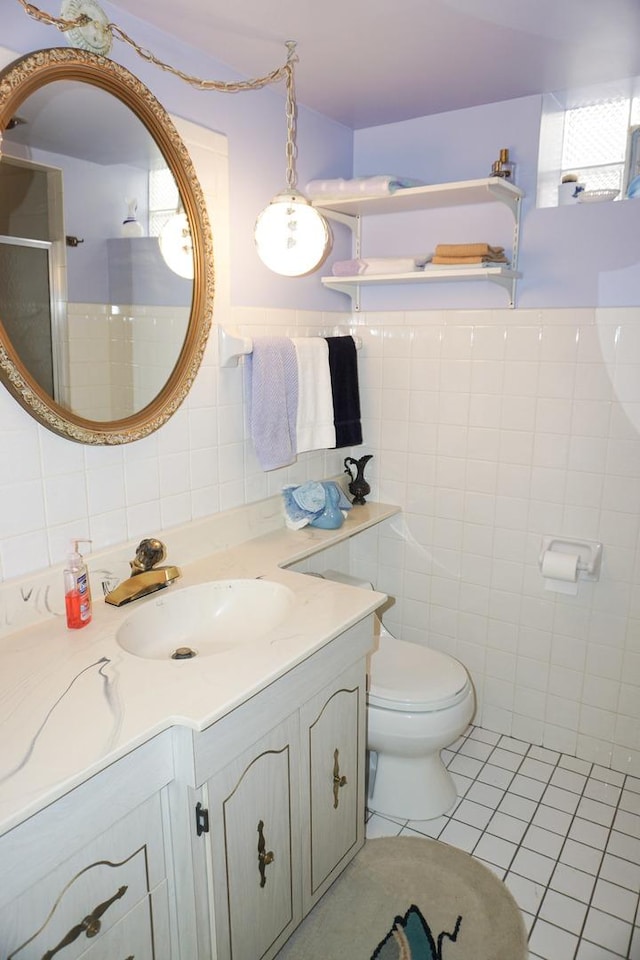 7632 W Norridge St, Harwood Heights, IL 60706 - full bathroom with tile walls, vanity, tile patterned floors, and an enclosed shower