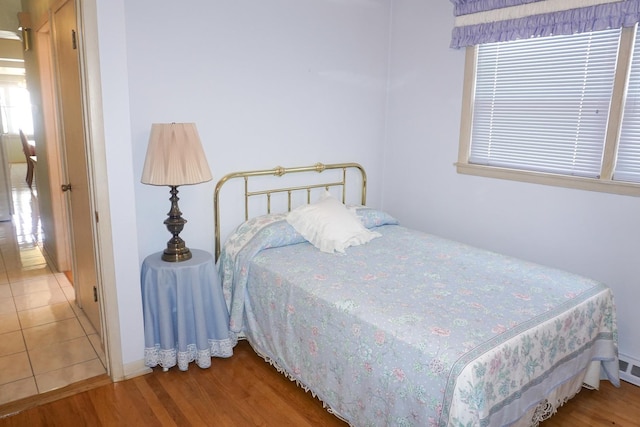 7632 W Norridge St, Harwood Heights, IL 60706 - bedroom featuring wood finished floors and multiple windows