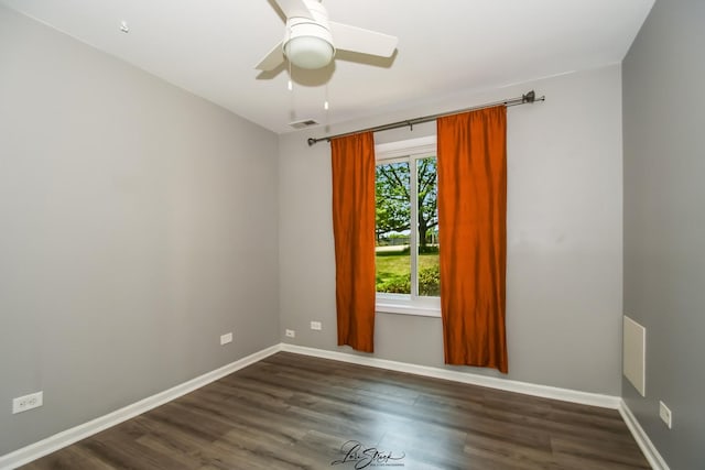 7000 Remington Ct Unit 102, Woodridge, IL 60517 - empty room with a ceiling fan and dark wood-style flooring