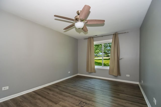 7000 Remington Ct Unit 102, Woodridge, IL 60517 - empty room with dark wood finished floors and a ceiling fan