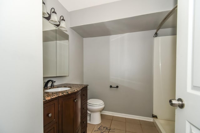7000 Remington Ct Unit 102, Woodridge, IL 60517 - bathroom featuring vanity, a shower, and tile patterned floors