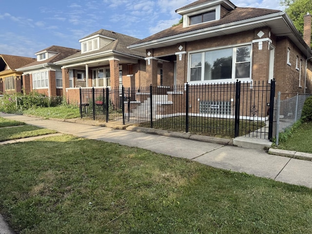 8014 S Bishop St, Chicago, IL 60620 - bungalow featuring brick siding and a fenced front yard