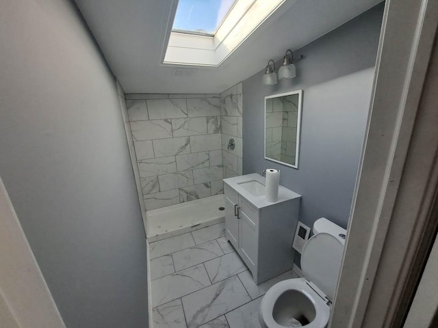 8014 S Bishop St, Chicago, IL 60620 - full bath featuring marble look tiles, a skylight, a shower stall, and vanity