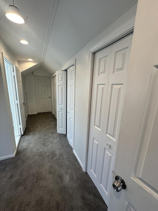 8014 S Bishop St, Chicago, IL 60620 - hallway featuring dark carpet, lofted ceiling, and recessed lighting