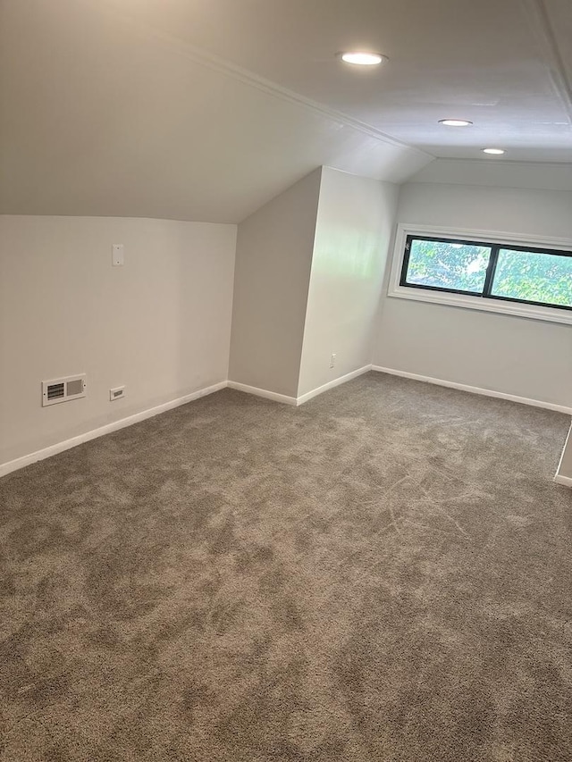 8014 S Bishop St, Chicago, IL 60620 - bonus room featuring vaulted ceiling, dark carpet, and recessed lighting