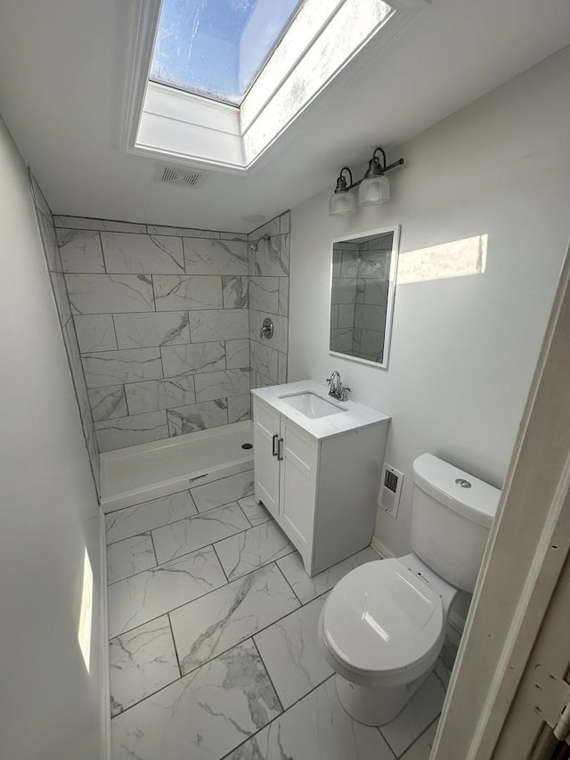 8014 S Bishop St, Chicago, IL 60620 - bathroom with marble finish flooring, a shower stall, vanity, and a skylight