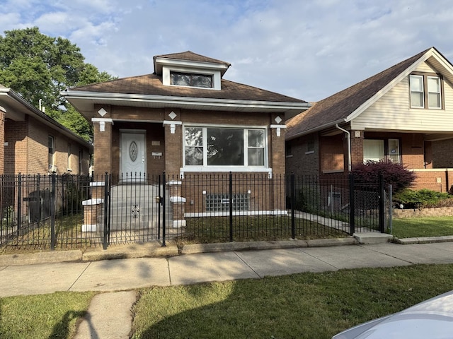 8014 S Bishop St, Chicago, IL 60620 - view of front facade featuring covered porch, brick siding, and a fenced front yard