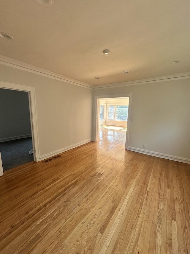 8014 S Bishop St, Chicago, IL 60620 - empty room with crown molding and wood finished floors