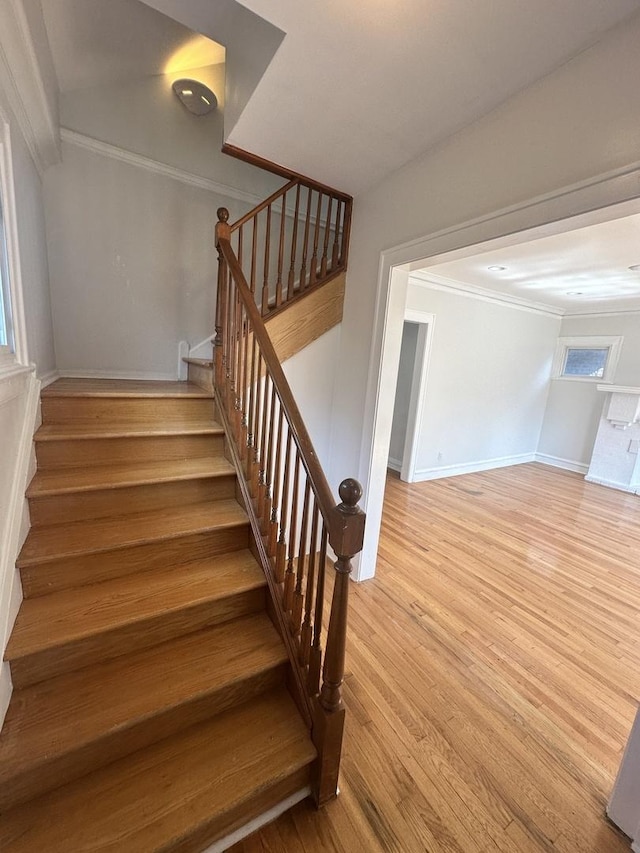 8014 S Bishop St, Chicago, IL 60620 - stairs with crown molding and wood finished floors