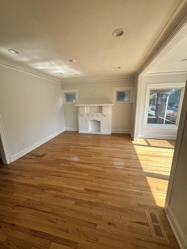 8014 S Bishop St, Chicago, IL 60620 - unfurnished living room featuring crown molding, wood finished floors, and recessed lighting