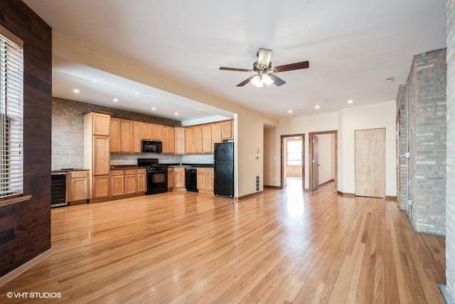 1634 W Columbia Ave Unit 2S, Chicago, IL 60626 - kitchen with black appliances, a ceiling fan, light wood-style flooring, wine cooler, and recessed lighting