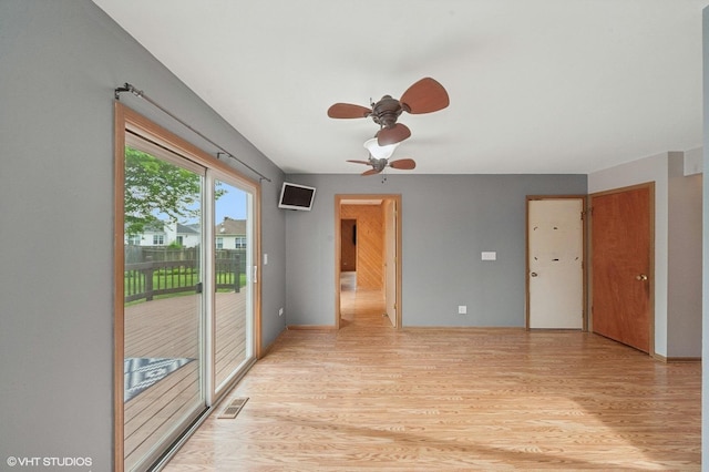 1531 Southport Ct, Zion, IL 60099 - unfurnished room featuring light wood finished floors and a ceiling fan