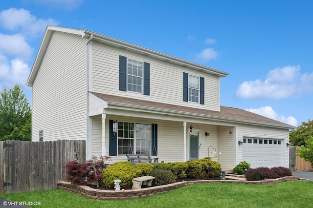 1531 Southport Ct, Zion, IL 60099 - traditional-style house featuring covered porch, an attached garage, and driveway