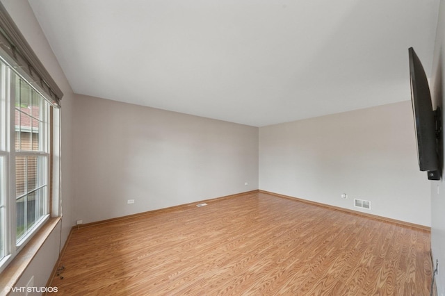 1531 Southport Ct, Zion, IL 60099 - spare room with wood finished floors and baseboards