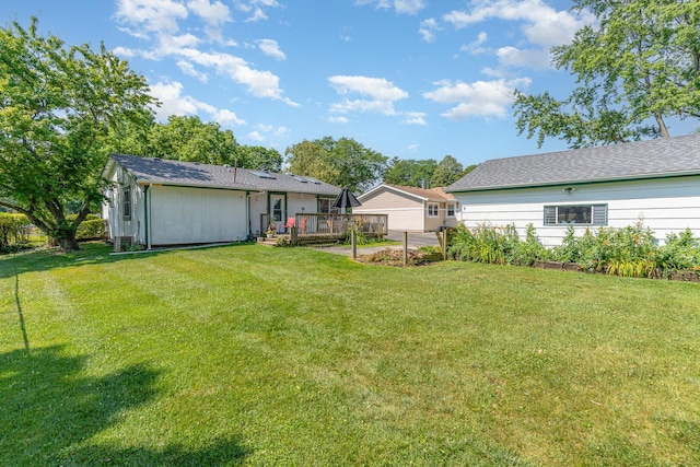 2308 Maple Ln, Rolling Meadows, IL 60008 - view of grassy yard with a wooden deck