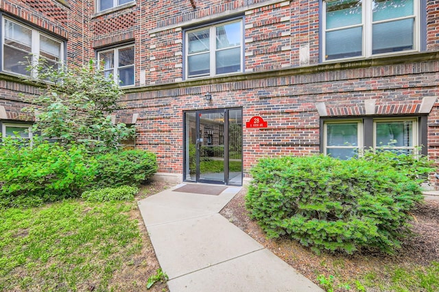 28 S 6th Ave Unit 1D, La Grange, IL 60525 - view of exterior entry featuring brick siding