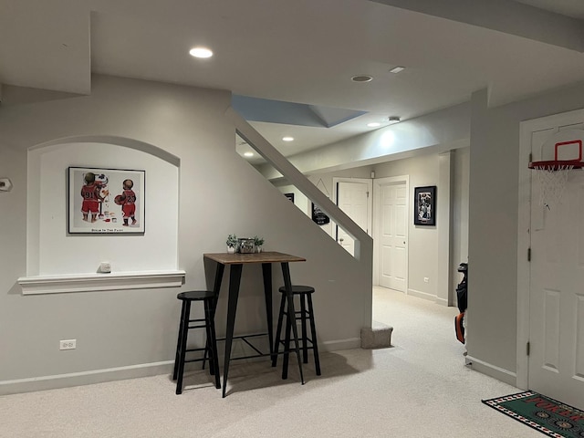 12534 Lily Ln, Plainfield, IL 60585 - bar with light colored carpet, stairway, and recessed lighting
