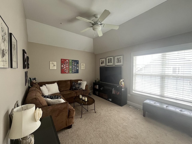 12534 Lily Ln, Plainfield, IL 60585 - living area featuring light carpet, a ceiling fan, and vaulted ceiling