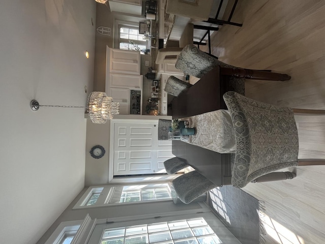 12534 Lily Ln, Plainfield, IL 60585 - living area featuring wood finished floors and a towering ceiling
