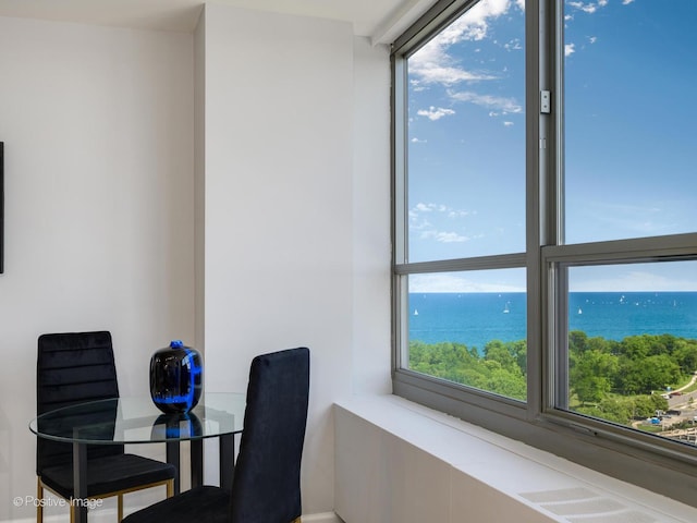 3550 N Lake Shore Dr Unit 1921, Chicago, IL 60657 - dining area featuring a water view
