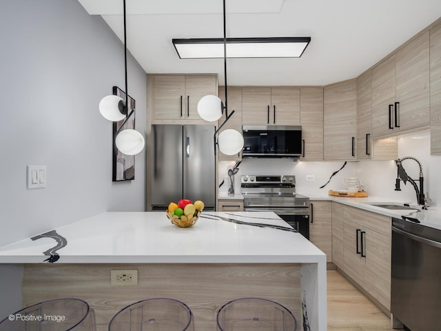 3550 N Lake Shore Dr Unit 1921, Chicago, IL 60657 - kitchen with stainless steel appliances, light brown cabinets, and modern cabinets