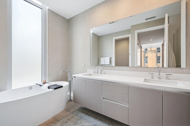 360 W Erie St Unit 3A, Chicago, IL 60654 - full bathroom featuring double vanity and a soaking tub