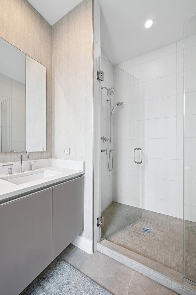 360 W Erie St Unit 3A, Chicago, IL 60654 - bathroom featuring a shower stall, vanity, and recessed lighting
