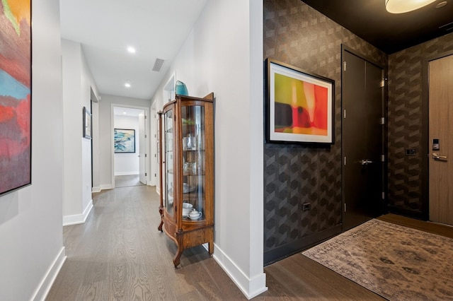 360 W Erie St Unit 3A, Chicago, IL 60654 - corridor featuring wood finished floors and wallpapered walls