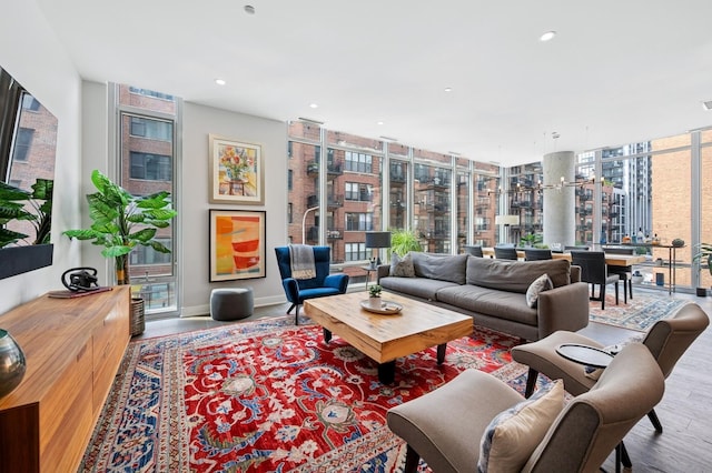 360 W Erie St Unit 3A, Chicago, IL 60654 - living room with wood finished floors, healthy amount of natural light, recessed lighting, and floor to ceiling windows