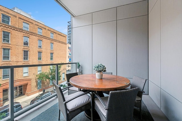 360 W Erie St Unit 3A, Chicago, IL 60654 - balcony featuring outdoor dining space